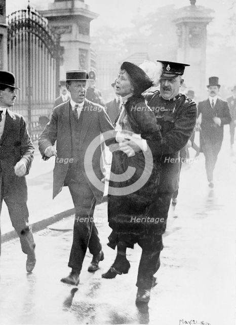 Emmeline Pankhurst arrested by Superintendent Rolfe outside Buckingham Palace, London, May 1914. Artist: Unknown