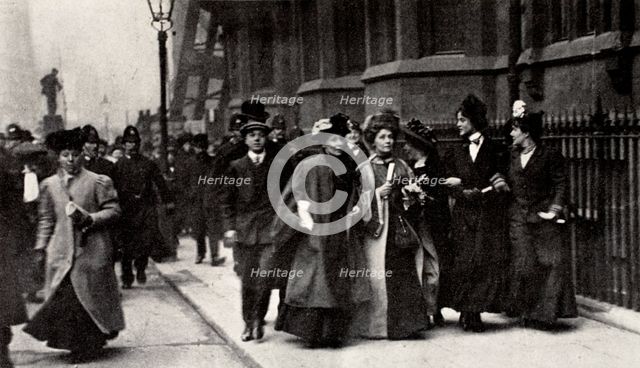 Emmeline Pankhurst, British suffragette leader, carrying a petition, London, 13 February 1908. Artist: Unknown