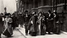 Emmeline Pankhurst, British suffragette leader, carrying a petition, London, 13 February 1908