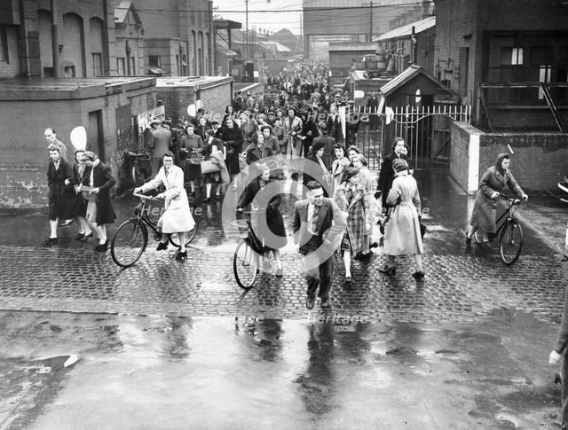 Employees leaving the Rolls-Royce works, Derby, WWII, c1939-c1945. Artist: Unknown