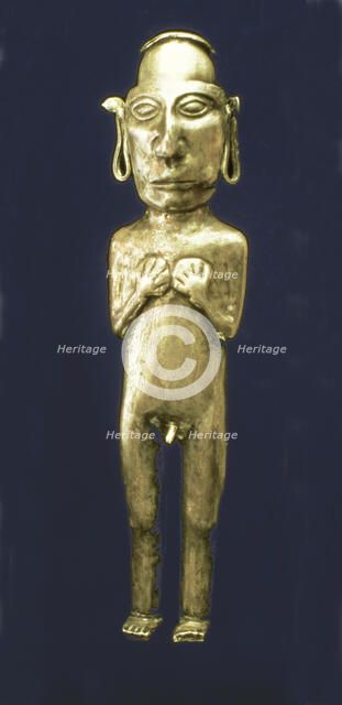 Empty anthropomorphic figure made of silver representing a male person with his arms across his c…