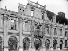Empty shell of the north side of inner courtyard at Kirby Hall, Gretton, Northamptonshire, 1925. Artist: Nathaniel Lloyd