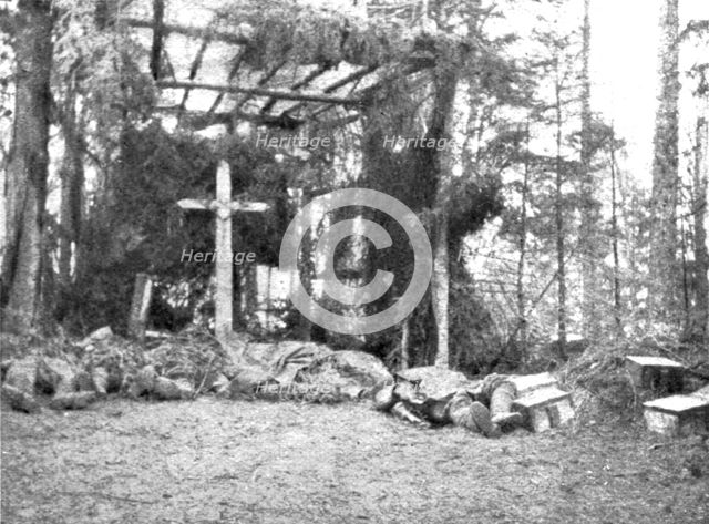 ''En Alsace; Une chapelle rustique dans la foret pour abriter nos morts', 1915. Creator: Unknown.