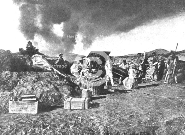 'En Extreme-Orient; Une canon de siege japonais devant Tsing-Tao...1914 (1924). Creator: Unknown.
