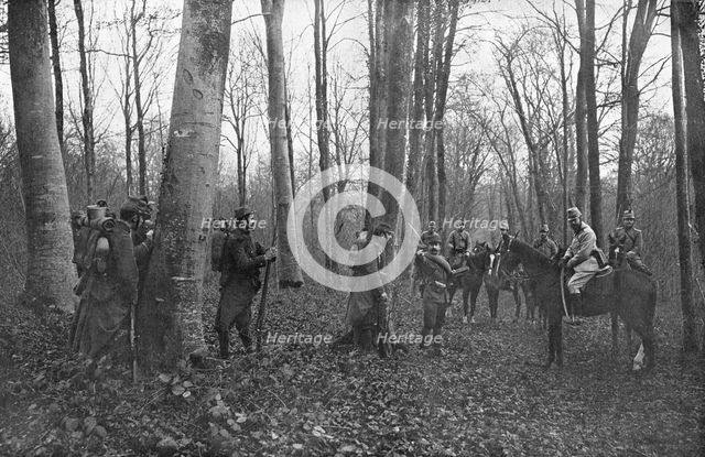 ''En Reconnaissance; la rencontre en foret de deux patrouilles Francaises', 1915. Creator: Unknown.