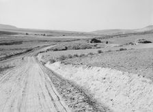 Entering Cow Hollow region in which practically all are FSA borrowers, Malheur County, Oregon, 1939. Creator: Dorothea Lange