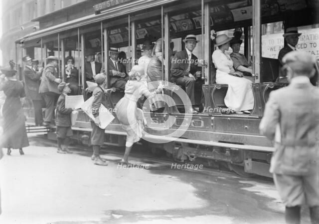 Entering street car ?, between c1910 and c1915. Creator: Bain News Service.