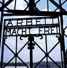 Entrance gate to the concentration camp of Dachau, with the inscription in German Arbeit macht f…