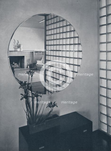 'Entrance hall in the house of Dr. and Mrs. James B. Graeser in Oakland, California, showning the gl Artist: Michael Goodman.