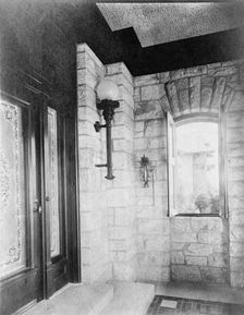 Entrance with etched glass door at left, sconce, and open window..., Greenwich, Connecticut, 1908. Creator: Frances Benjamin Johnston