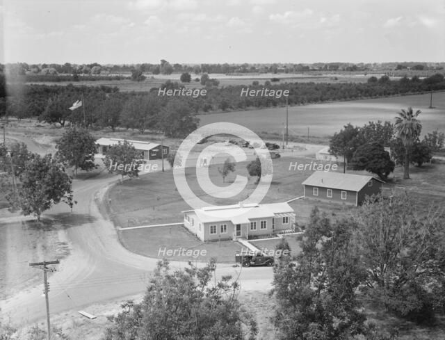 Entrance to camp showing clinic, Farmersville, California, 1939. Creator: Dorothea Lange.