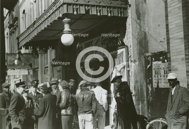 Entrance to a movie house, Beale Street, Memphis, Tennessee, October 1939. Creators: Farm Security Administration, Marion Post Wolcott.