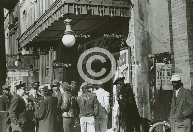 Entrance to a movie house, Beale Street, Memphis, Tennessee, October 1939. Creators: Farm Security Administration, Marion Post Wolcott.