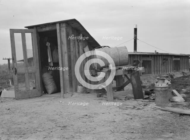 Entrance to Mr. and Mrs. Wardlow's dugout basement home, Dead Ox Flat, Oregon, 1939 Creator: Dorothea Lange.