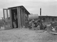 Entrance to Mr. and Mrs. Wardlow's dugout basement home, Dead Ox Flat, Oregon, 1939 Creator: Dorothea Lange