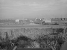 Entrance to Nyssa Farm family labor camp, FSA mobile unit...1, Near Nyssa, Oregon, 1939. Creator: Dorothea Lange
