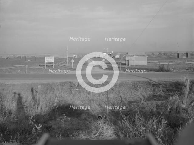 Entrance to Nyssa Farm family labor camp, FSA mobile unit...1, Near Nyssa, Oregon, 1939. Creator: Dorothea Lange.