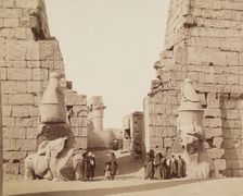 Entrance to Temple of Luxor with Colossal Statues of Luxor, East Bank Ramesses, between 1860 & 1903. Creator: Antonio Beato