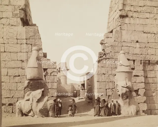 Entrance to Temple of Luxor with Colossal Statues of Luxor, East Bank Ramesses, between 1860 & 1903. Creator: Antonio Beato.