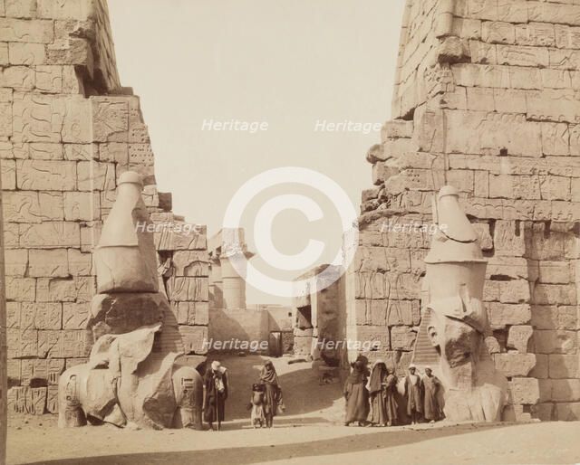 Entrance to Temple of Luxor with Colossal Statues of Luxor, East Bank Ramesses, between 1860 & 1903. Creator: Antonio Beato.