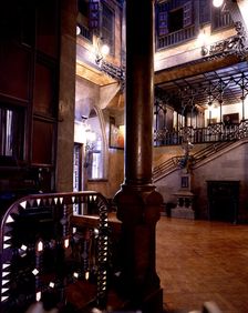 Entrance to the main hall of the Güell Palace, from the corridor that links it to the dining room…