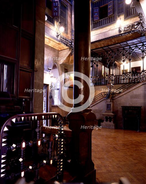 Entrance to the main hall of the Güell Palace, from the corridor that links it to the dining room…