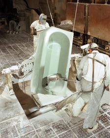 Enamelling a steel bath at Ideal Standard, Hull, Humberside, 1967. Creator: Michael Walters