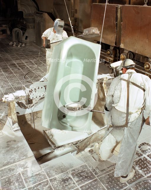 Enamelling a steel bath at Ideal Standard, Hull, Humberside, 1967.  Creator: Michael Walters.
