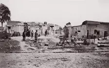 [Encampment with shacks and laundry]. Brady album, p. 129, 1861-65. Creator: Unknown