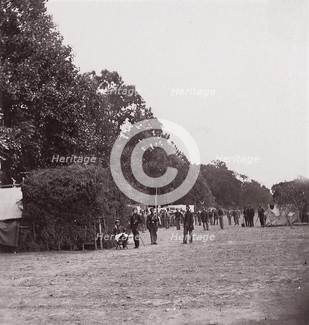 [Encampment alongside a stand of trees]. Brady album, p. 123, 1861-65. Creator: Unknown.