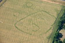 Enclosure and ring ditch crop marks near Minster, Kent, 2015. Creator: Historic England