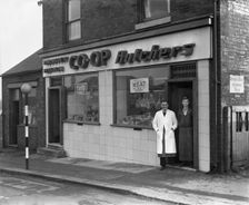 End of rationing, meat and bacon on sale at the Barnsley Co-op butchers, South Yorkshire, 1954. Artist: Michael Walters