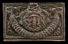 End panel of a writing casket: Medusa Head, Garland, and Bucrania, c. 1500. Creator: Unknown