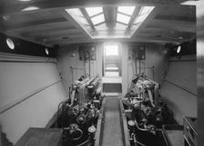 Engine room on cabin cruiser D.G.S.P., 1913. Creator: Kirk & Sons of Cowes