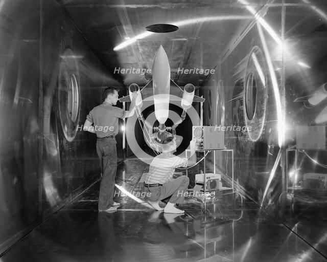 Engineers check body revolution model, Ohio, USA, July 31, 1957.  Creator: Unknown.