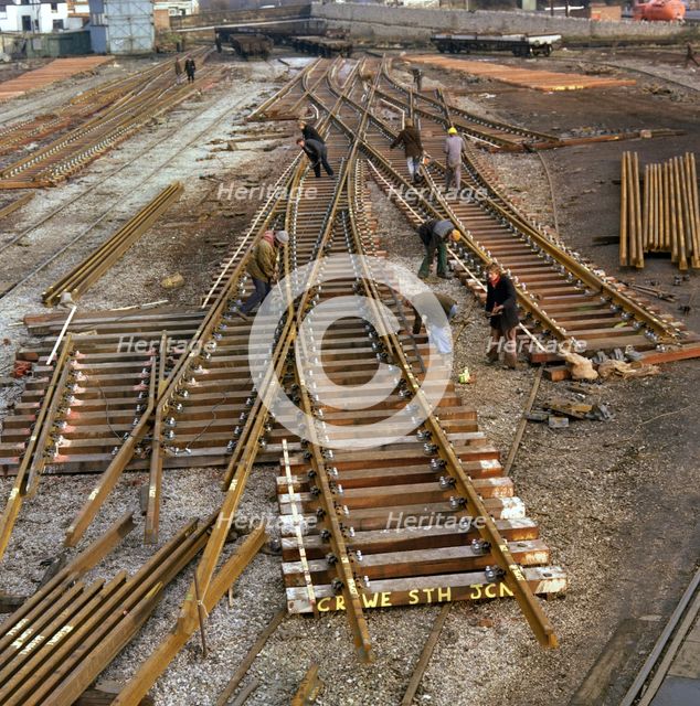 Engineers fabricating a rail junction for the Crewe South Junction before delivery, 1977. Artist: Michael Walters