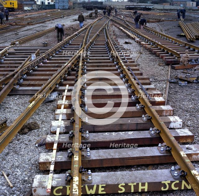 Engineers fabricating a rail junction for the Crewe South Junction before delivery, 1977. Artist: Michael Walters
