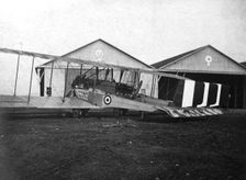 England. Caproni 600 biplane H 1918 next to the hangars
