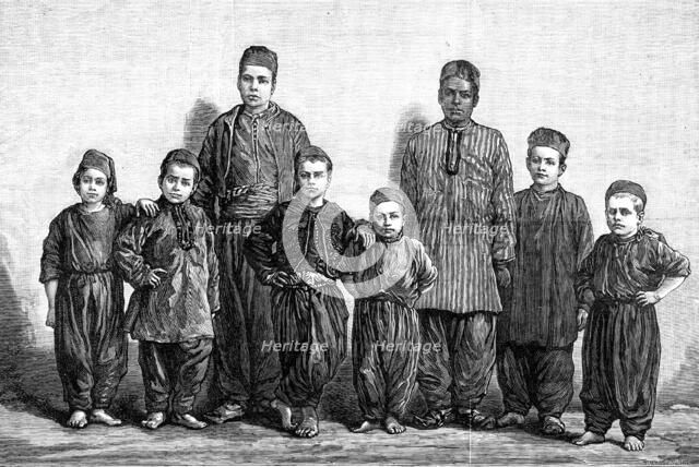 English acrobat boys detained by an Arab company in Constantinople, 1881. Creator: R&E Taylor.