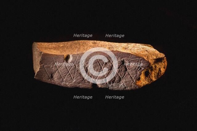 Engraved Ocher Plaque from Blombos Cave, South Africa. The oldest artifact of mankind, 70th millenni