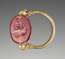 Engraved Scarab with Aphrodite Bathing in a Gold Swivel Ring, about 350 BC. Creator: Unknown