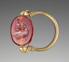 Engraved Scarab with Aphrodite Bathing in a Gold Swivel Ring, about 350 BC. Creator: Unknown
