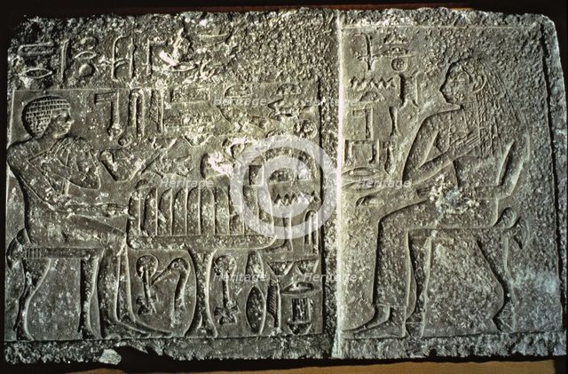 Engravings on a gravestone from the Giza Necropolis.