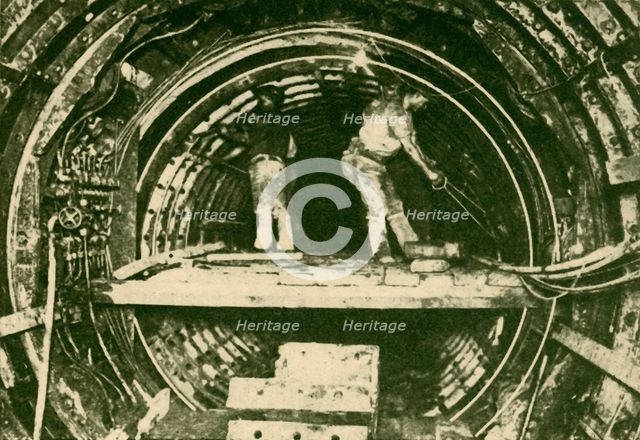 'Enlarging Tunnels on the City and South London Railway, Shoowing New and Old Diameters', 1930. Creator: Unknown.
