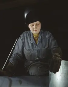 Enola O'Connell, age 32, widow and mother of one child...Heil and Co., Milwaukee, Wisconsin, 1943. Creator: Howard Hollem