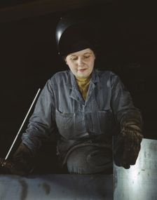 Enola O'Connell, age 32, widow and mother of one child...Heil and Co., Milwaukee, Wisconsin, 1943. Creator: Howard Hollem