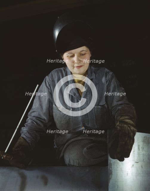 Enola O'Connell, age 32, widow and mother of one child...Heil and Co., Milwaukee, Wisconsin, 1943. Creator: Howard Hollem.