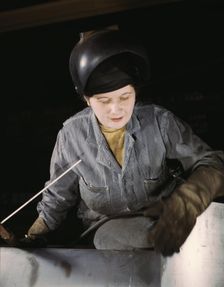 Enola O'Connell, age 32, widow and mother of one child...Heil and Co., Milwaukee, Wisc., 1943. Creator: Howard Hollem