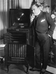 Enrico Caruso with phonograph, between 1918 and c1920. Creator: Bain News Service