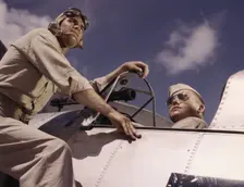 Ens[ign] Noressey and Cadet Thenics at the Naval Air Base, Corpus Christi, Texas, 1942. Creator: Howard Hollem